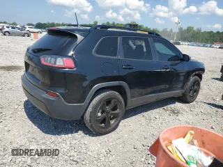 2021 Jeep Cherokee Altitude with VIN 1C4PJLLBXMD144549, listed as a Copart auction lot 62163435 with 94,571 mi miles and Salvage title. Bid and sale history available at DreamBid. Image 3.