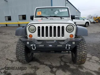 2007 Jeep Wrangler Unlimited X with VIN 1J4GA39177L105582, listed as a Copart auction lot 88912935 with 156,156 mi miles and Salvage Title. Bid and sale history available at DreamBid. Image 5.