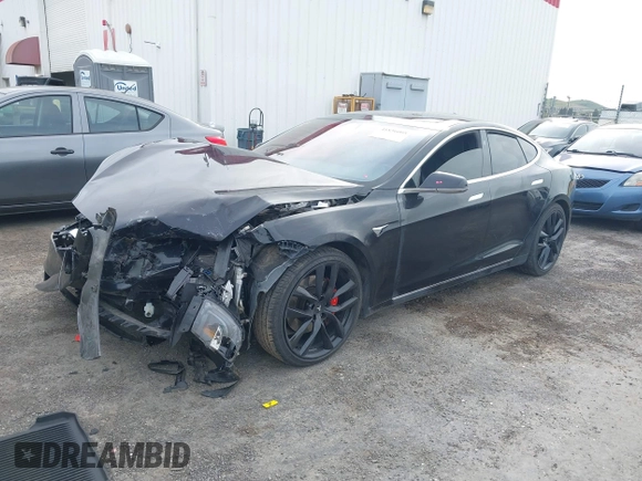 2016 Tesla Model S 90D z VIN 5YJSA1E4XGF171681, wystawiony jako IAAI lot #41836005 z przebiegiem 81 063 mil mil oraz . Historia ofert i sprzedaży dostępna na DreamBid. Obrazek 18.