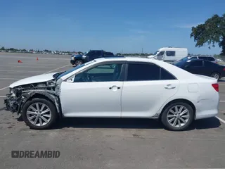 2012 Toyota Camry XLE z VIN 4T1BD1FK0CU007194, wystawiony jako IAAI lot #42281914 z przebiegiem 186 379 mil mil oraz . Historia ofert i sprzedaży dostępna na DreamBid. Obrazek 15.