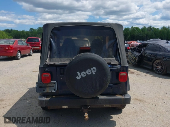2002 Jeep Wrangler X with VIN 1J4FA39S82P735794, listed as a IAAI auction lot 42411386 with 141,219 mi miles and . Bid and sale history available at DreamBid. Image 15.