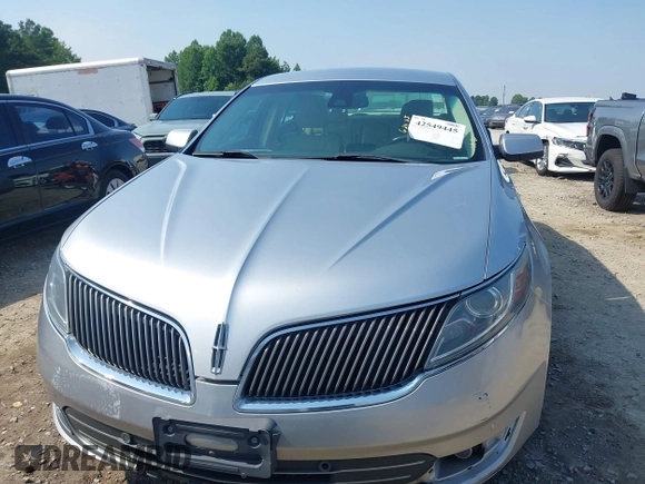 2013 Lincoln MKS with VIN 1LNHL9DK3DG614933, listed as a IAAI auction lot 42549445 with 313,182 mi miles and . Bid and sale history available at DreamBid. Image 12.