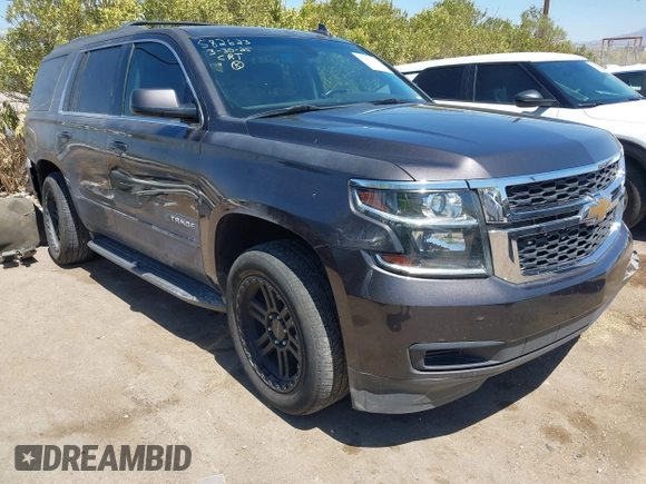 2017 Chevrolet Tahoe LS with VIN 1GNSCAKC3HR328833, listed as a IAAI auction lot 41993364 with 124,817 mi miles and . Bid and sale history available at DreamBid. Image 1.