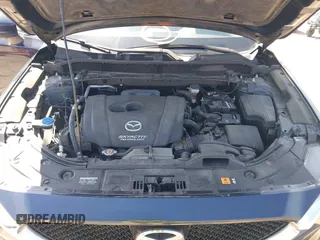 2017 Mazda CX-5 Touring with VIN JM3KFBCL9H0163449, listed as a IAAI auction lot 41919020 with 102,898 mi miles. Bid and sale history available at carsss.com. Image 10.