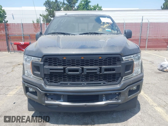 2018 Ford F-150 XL with VIN 1FTEW1CPXJKD56562, listed as a IAAI auction lot 42588371 with 137,496 mi miles and . Bid and sale history available at DreamBid. Image 12.