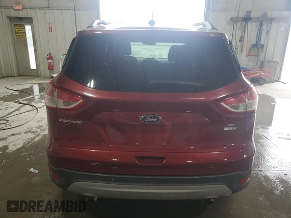 2016 Ford Escape SE with VIN 1FMCU9GXXGUB86959, listed as a Copart auction lot 54616815 with 141,086 mi miles and Clean Title. Bid and sale history available at DreamBid. Image 6.