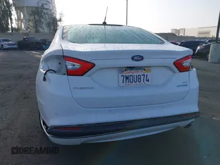 2016 Ford Fusion SE Hybrid with VIN 3FA6P0LU4GR144591, listed as a IAAI auction lot 42592828 with 96,184 mi miles and . Bid and sale history available at DreamBid. Image 6.