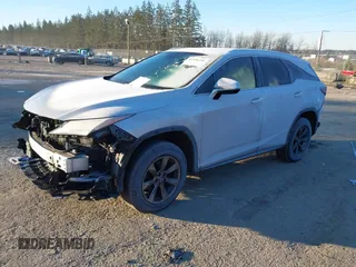 2018 Lexus RX 350L Premium z VIN JTJDZKCAXJ2008164, wystawiony jako IAAI lot #41436168 z przebiegiem 126 798 mil mil oraz . Historia ofert i sprzedaży dostępna na DreamBid. Obrazek 2.