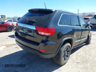 2013 Jeep Grand Cherokee Laredo with VIN 1C4RJFAG2DC643926, listed as a IAAI auction lot 41723575 with 125,048 mi miles. Bid and sale history available at carsss.com. Image 4.