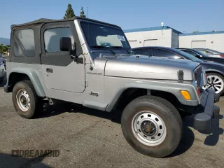 2000 Jeep Wrangler SE with VIN 1J4FA29P3YP770094, listed as a Copart auction lot 65419385 with 150,364 mi miles and Clean title. Bid and sale history available at DreamBid. Image 4.