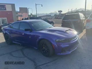 2023 Dodge Charger SRT Hellcat Redeye Widebody z VIN 2C3CDXL97PH585769, wystawiony jako Copart lot #61137895 z przebiegiem 5 535 mil mil oraz Czysty tytuł • Clean title. Historia ofert i sprzedaży dostępna na DreamBid. Obrazek 1.