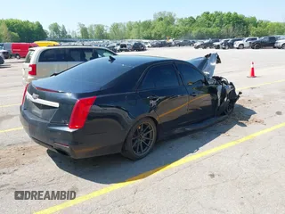2014 Cadillac CTS Vsport RWD z VIN 1G6AU5S87E0176224, wystawiony jako IAAI lot #42273736 z przebiegiem Nie podano mil oraz . Historia ofert i sprzedaży dostępna na DreamBid. Obrazek 4.