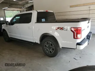 2015 Ford F-150 XLT with VIN 1FTEW1EP1FKD42960, listed as a Copart auction lot 59285335 with 209,452 mi miles and Salvage title. Bid and sale history available at DreamBid. Image 2.