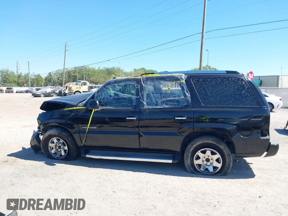 2005 Cadillac Escalade z VIN 1GYEK63N75R134012, wystawiony jako IAAI lot #41821485 z przebiegiem 165 655 mil mil oraz . Historia ofert i sprzedaży dostępna na DreamBid. Obrazek 13.