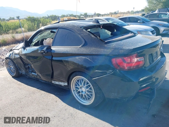 2014 BMW 2 Series M235i with VIN WBA1J7C50EVX33903, listed as a IAAI auction lot 40207684 with 81,766 mi miles and . Bid and sale history available at DreamBid. Image 3.