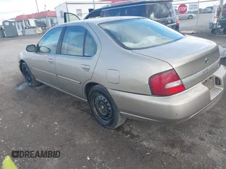 2001 Nissan Altima GXE with VIN 1N4DL01DX1C213778, listed as a IAAI auction lot 41230878 with 204,003 mi miles. Bid and sale history available at carsss.com. Image 3.