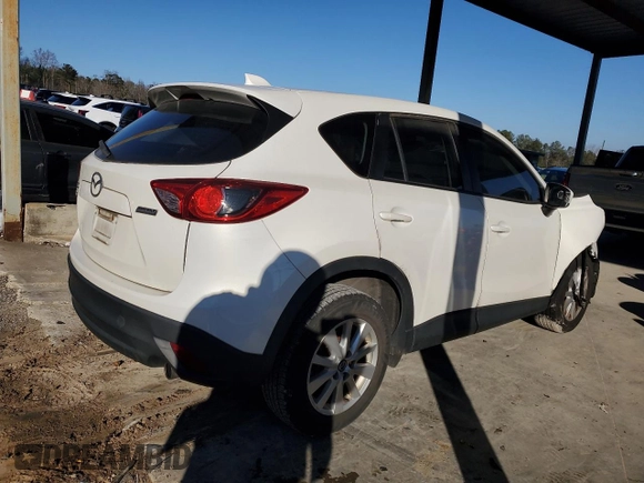 2014 Mazda CX-5 Sport with VIN JM3KE2BEXE0332590, listed as a Copart auction lot 87534365 with Not Provided miles and Salvage Title. Bid and sale history available at carsss.com. Image 3.