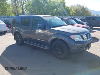 2012 Nissan Pathfinder SV z VIN 5N1AR1NBXCC605801, wystawiony jako IAAI lot #42227408 z przebiegiem 215 837 mil mil oraz . Historia ofert i sprzedaży dostępna na DreamBid. Obrazek 1.