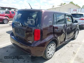 2008 Scion xB with VIN JTLKE50E281001793, listed as a IAAI auction lot 41947484 with 141,423 mi miles. Bid and sale history available at carsss.com. Image 4.