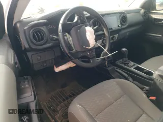 2023 Toyota Tacoma SR with VIN 3TYRX5GN2PT083718, listed as a Copart auction lot 49546035 with 23,005 mi miles and Salvage title. Bid and sale history available at DreamBid. Image 8.