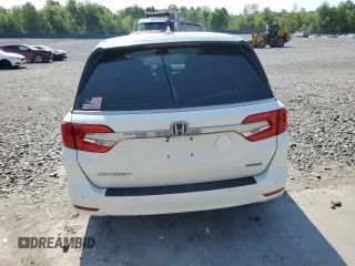 2019 Honda Odyssey Touring with VIN 5FNRL6H81KB051846, listed as a Copart auction lot 58723015 with 68,142 mi miles and Salvage title. Bid and sale history available at DreamBid. Image 6.