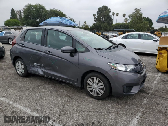 2015 Honda Fit LX z VIN 3HGGK5H58FM785137, wystawiony jako Copart lot #59013315 z przebiegiem 84 592 mil mil oraz Szkoda całkowita • Salvage title. Historia ofert i sprzedaży dostępna na DreamBid. Obrazek 4.