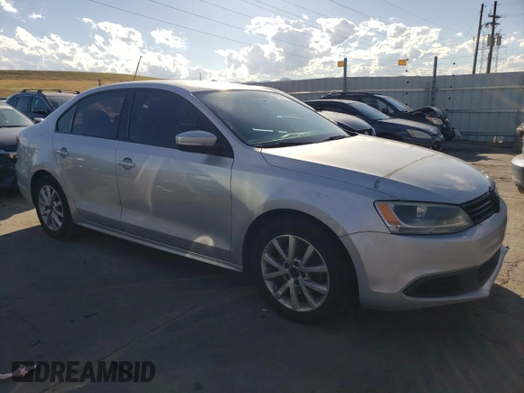 2012 Volkswagen Jetta SE with VIN 3VWDX7AJ4CM077031, listed as a Copart auction lot 67516484 with 201,024 mi miles and Salvage title. Bid and sale history available at DreamBid. Image 4.