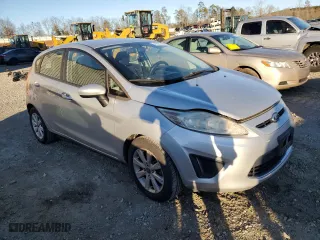 2012 Ford Fiesta SE with VIN 3FADP4EJ3CM194231, listed as a Copart auction lot 48000555 with 142,666 mi miles and Salvage Title. Bid and sale history available at carsss.com. Image 4.
