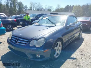 2009 Mercedes-Benz CLK-Class 3.5L with VIN WDBTK56FX9T108975, listed as a IAAI auction lot 41884199 with 121,764 mi miles. Bid and sale history available at carsss.com. Image 2.