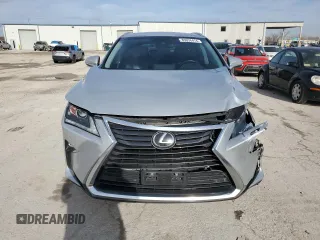 2017 Lexus RX with VIN 2T2BZMCA8HC094328, listed as a Copart auction lot 85038414 with 124,485 mi miles and Salvage Title. Bid and sale history available at carsss.com. Image 5.