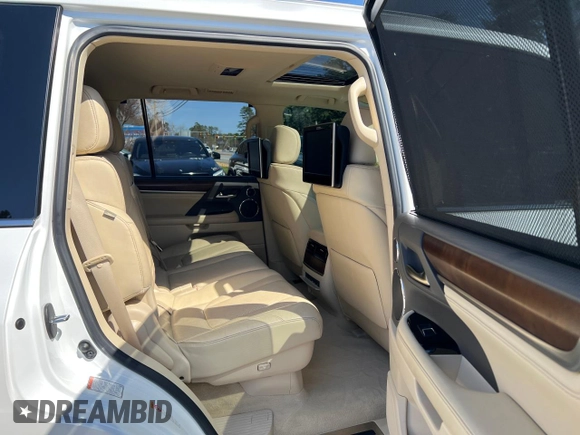 2016 Lexus LX 570 with VIN JTJHY7AX8G4198794, listed as a Copart auction lot 54615015 with 107,196 mi miles and Clean Title. Bid and sale history available at DreamBid. Image 6.