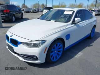 2017 BMW 3 Series 330e iPerformance with VIN WBA8E1C51HK895223, listed as a IAAI auction lot 41492625 with 116,486 mi miles. Bid and sale history available at carsss.com. Image 2.