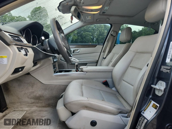 2014 Mercedes-Benz E 350 Sport with VIN WDDHF5KBXEA872156, listed as a Copart auction lot 60892695 with 166,555 mi miles and Salvage title. Bid and sale history available at DreamBid. Image 7.
