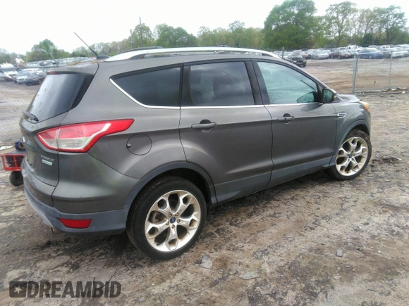 2013 Ford Escape Titanium with VIN 1FMCU0J92DUC70534, listed as a IAAI auction lot 41967096 with 77,921 mi miles and . Bid and sale history available at carsss.com. Image 4.