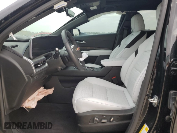 2024 Cadillac XT4 FWD Sport with VIN 1GYFZER46RF213543, listed as a Copart auction lot 83609754 with 3,878 mi miles and Salvage title. Bid and sale history available at DreamBid. Image 7.