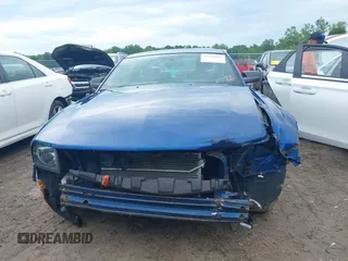 2009 Ford Mustang with VIN 1ZVHT80N795142637, listed as a IAAI auction lot 42595602 with 69,284 mi miles and . Bid and sale history available at DreamBid. Image 13.