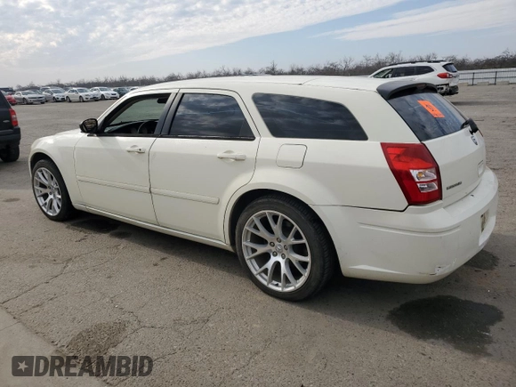 2005 Dodge Magnum z VIN 2D4FV48TX5H692873, wystawiony jako Copart lot #87230504 z przebiegiem 166 497 mil mil oraz Szkody całkowita. Historia ofert i sprzedaży dostępna na DreamBid. Obrazek 2.