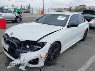 2021 BMW 3 Series 330i z VIN 3MW5R1J04M8C06043, wystawiony jako IAAI lot #42109872 z przebiegiem 62 325 mil mil oraz . Historia ofert i sprzedaży dostępna na DreamBid. Obrazek 6.