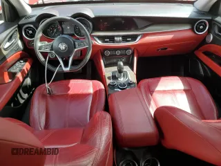 2018 Alfa Romeo Stelvio Ti z VIN ZASFAKBN5J7B90714, wystawiony jako Copart lot #56675895 z przebiegiem 87 642 mil mil oraz Czysty tytuł • Clean title. Historia ofert i sprzedaży dostępna na DreamBid. Obrazek 8.