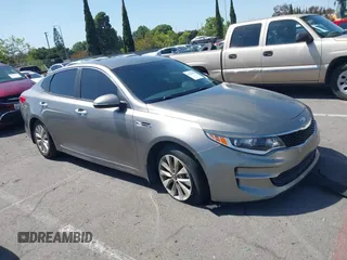 2018 Kia Optima LX with VIN 5XXGT4L38JG258818, listed as a IAAI auction lot 42237498 with 105,321 mi miles and . Bid and sale history available at DreamBid. Image 1.