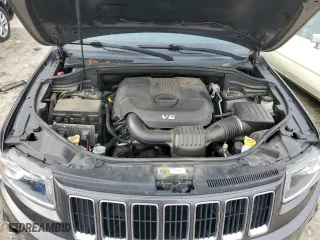 2015 Jeep Grand Cherokee Laredo with VIN 1C4RJFAG4FC627438, listed as a Copart auction lot 44078074 with 123,681 mi miles and Salvage Title. Bid and sale history available at carsss.com. Image 12.