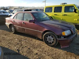 1998 Mercedes-Benz C 230/260/280/320 with VIN WDBHA23G0WA629568, listed as a Copart auction lot 43560945 with 252,554 mi miles and Salvage Title. Bid and sale history available at carsss.com. Image 4.