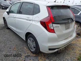 2019 Honda Fit LX with VIN 3HGGK5H40KM737343, listed as a IAAI auction lot 42732609 with 71,343 mi miles and . Bid and sale history available at DreamBid. Image 3.