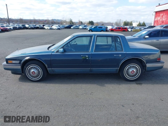 1986 Cadillac Seville z VIN 1G6KS6989GU813079, wystawiony jako IAAI lot #41732353 z przebiegiem Nie podano mil oraz . Historia ofert i sprzedaży dostępna na DreamBid. Obrazek 14.