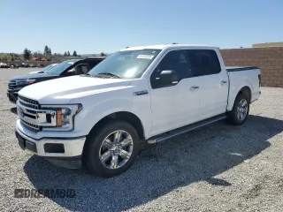 2018 Ford F-150 XL with VIN 1FTEW1CG9JKC34890, listed as a Copart auction lot 49333255 with 154,536 mi miles and Salvage Title. Bid and sale history available at carsss.com. Image 1.