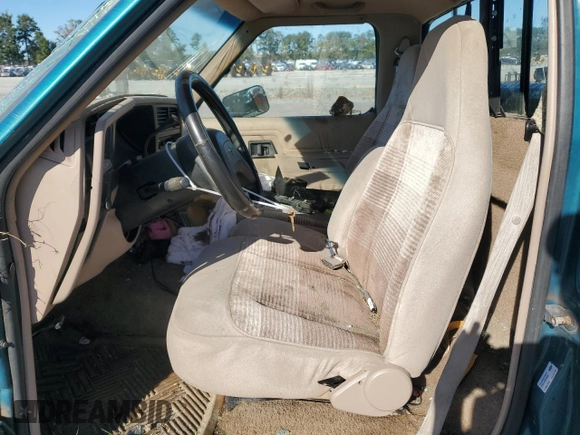 1992 Ford Ranger with VIN 1FTCR10A3NTA81065, listed as a Copart auction lot 74002434 with 9,827 mi miles and Salvage Title. Bid and sale history available at carsss.com. Image 7.