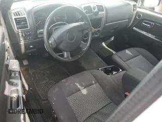 2012 GMC Canyon z VIN 1GTE5MFE6C8169267, wystawiony jako Copart lot #50096415 z przebiegiem 192 546 mil mil oraz Czysty tytuł • Clean title. Historia ofert i sprzedaży dostępna na DreamBid. Obrazek 8.
