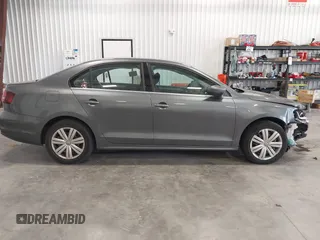 2017 Volkswagen Jetta S with VIN 3VW2B7AJ4HM357707, listed as a IAAI auction lot 42606933 with 124,253 mi miles and . Bid and sale history available at DreamBid. Image 14.