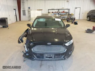 2016 Ford Fusion Titanium Hybrid with VIN 3FA6P0RU7GR127307, listed as a IAAI auction lot 41944427 with 128,076 mi miles. Bid and sale history available at carsss.com. Image 13.