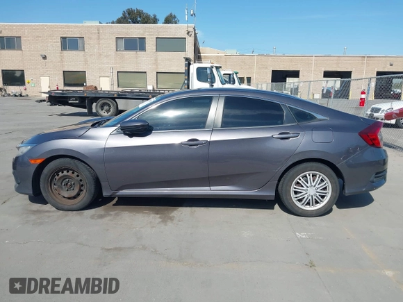 2016 Honda Civic Sedan LX with VIN 19XFC2F53GE213624, listed as a IAAI auction lot 41993834 with 112,052 mi miles. Bid and sale history available at carsss.com. Image 14.